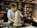 Throwing a tall Bottle Vase on the potters wheel demo. Pottery clay vase making