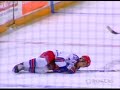Steve Downie is crushed at centre ice by Sergei Kostitsyn