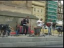 Apu,Peruvian band playing in front of the Gray's Monument in Newcastle England