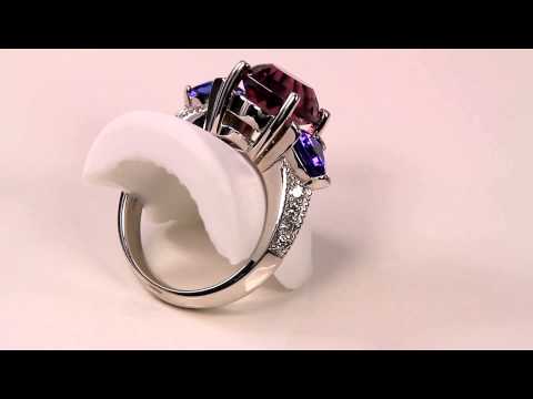 Gem quality Rhodolite Garnet Accented by Trilliant Tanzanites and Fine Diamond 