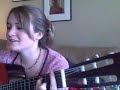 torn cover acoustic guitar