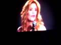 lady rushes the stage at a Brad Paisley Concert