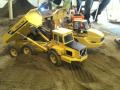 Compare Stahl Volvo A25C dumptruck with Wedico Cat 740
