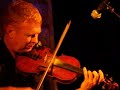 http://www.lunasa.ie/home.php
http://www.myspace.com/lunasaofficial 
14 clips, recorded on friday, 31st august 2007 at metropole hotel as part of beamish cork folk festival, 2007

named for an ancient celtic harvest festival in honour of the irish god lugh, patron of the arts, l�nasa is indeed a gathering of some of the top musical talents in ireland.

sean smyth - fiddle and whistles. 
born in straide, county mayo, and now living in galway, sean is an all-ireland champion on both fiddle and whistle. his 1993 solo debut, the blue fiddle, was named one of the ten best albums of that year by the irish echo. 

kevin crawford - flutes, whistles and bodhran. 
an exceptional flute, whistle, and bodhran player.born in birmingham, england, and living in ennis, county clare, he has also recorded with grianin, raise the rafters, joe derrane, and sean tyrrell, and appears on the 1994 recording the sanctuary sessions. in 1994, kevin made his first solo album, 'd' flute album, available on green linnet records.
 
trevor hutchinson -upright bass. 
from cookstown, county tyrone, and living in dublin, trevor played bass with the waterboys from 1986 to 1991. with that rock band, he recorded fisherman's blues (1988) and room to roam (1990), the latter featuring sharon shannon. after that, he made three albums as a member of the sharon shannon band: 1991's sharon shannon, 1994's out the gap, and 1997's each little thing, the last two available on green linnet records. a much-in-demand musician, trevor has also recorded with moving cloud, altan's dermot byrne, m�ire breatnach, and eileen ivers of riverdance fame. 
 
cillian vallely -uillean pipes and whistles. 
a gifted armagh-born uilleann pipes and low whistle player, cillian comes from the same talented musical family as his brother niall vallely, concertina player with the group nomos. cillian has spent most of the recent past touring in the us, performing with bands such as new york-based 'whirligig', paddy o'brien's 'chulrua' and with clare fiddler seamus connolly. he was featured as uilleann pipes soloist in the broadway production of 'riverdance' and toured with tim o'brien in 