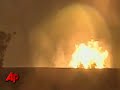 Raw Video: Fire Burns at Houston Landmark Raw Video: Fire Burns at Houston Landmark