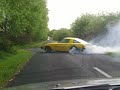 skids nz style v8 in a small car swingin o,z on a tight road skids nz style v8 in a small car swingin o,z on a tight road