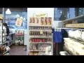 joanne and andrew visit the kwik-e-mart on 42nd street in new york city