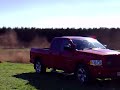Ford Explorer rolls while doing burnout in a paddock Ford Explorer rolls while doing burnout in a paddock
