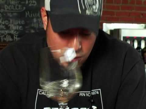 how to properly hold a wine glass