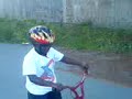 Omar learns how to ride his bike