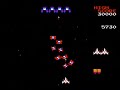 the gameplay of galaga for nes. created by namco.