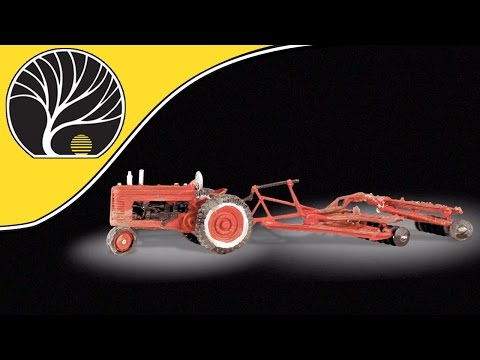 model vehicles - Learn more at http://WoodlandScenics.com AutoScenes - Tractor & Disc: Highly detailed and custom painted vintage tractor and double disc assembly.