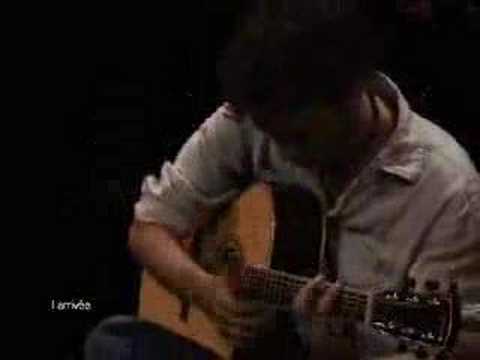 acoustic guitar tapping