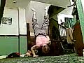 One arm assisted handstand pressups (right)