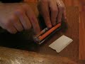 Rolling a cigarrette with a rolling machine