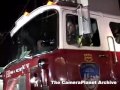 9/11 tribute lights close up, firemen and trucks