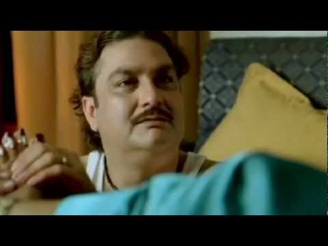 Johnny Gaddaar - Prakash (Vinay Pathak) convinces his wife to mortgage her parlour