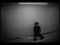 Tsutomu seriously practices the song 