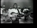 the hullaballoos live on tv in 1965, introduced by future ritz chip's spokesman, george hamilton