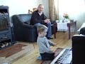 Toby playing synthesizer in our Latvian house Jekabpils