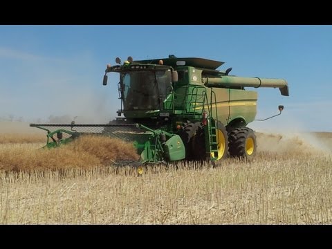 canola - Harvesting canola at Nerrina Farms, our John Deere S670 combine with a hired canola pickup attached. Check out where our canola goes: http://www.youtube.com/...