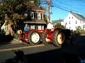 Larry and the Pet Stop Tractor ride in the big parade