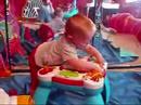 Dylan - almost 11 months, playing