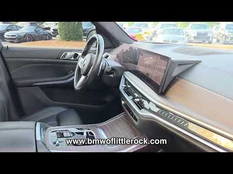 Used 2023 Black Sapphire Metallic BMW XDRIVE40I SPORTS ACTIVITY VEHICLE image 1