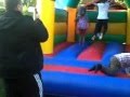 kaitlan was very lucky girl just missed the path as she flew over the back of bounceing castle.