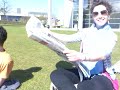 Rachel attempts to read a broadsheet in the wind