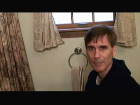 how to fasten tub to wall