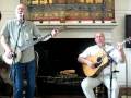 the legendary pete seeger and congressman john hall (d-ny) former frontman for orleans, sing this land, joined by a supportive audience.