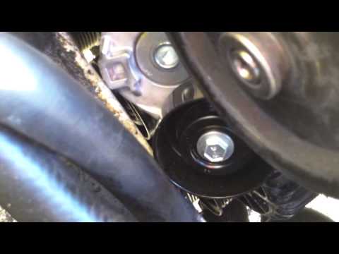 DIY How to replace repair install drive belt tensioner 2000 Ford Focus LX