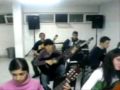 Guitar players 4th week their first piece ( Classroom 2)