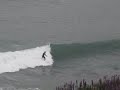 Surfing off topsail beach