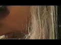 kinky blonde licking her leg