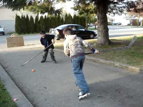 SCORESTREETHOCKEYSHOOTOUT - Hockey game at Knelay's house.