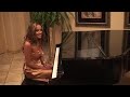 Kristine Mirelle playing her song, Toyz