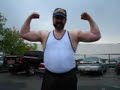 Musclebear flexes in front of TPS after pumping up