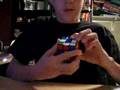 Kid Genius Strikes Back does Rubiks in :20 seconds