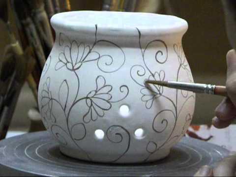 Decorazione di un portaglio in ceramica