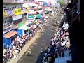 Every year this Elephant Race is held in the main street of Guruvayur, from the Bus station to the temple. Massive bamboo fences on both sides of the street begin appearing two days before, and as the event approaches, Guruvayur becomes three-dimensional, with people filling every lookout point above the street. The race is short, but high energy!! - The Annual Elephant Race, 2008 - Guruvayur, Kerala - India -