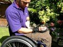 quadraplegic using gripping aid with garden tools quadraplegic using gripping aid with garden tools