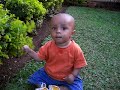 Jona playing with bush