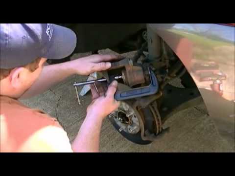 How to change your front disk brakes on a 2007 Kia Sportage
