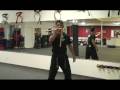 Advanced Nunchucks Techniques : Shoulder to Shoulder Throw With Nunchucks