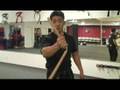 Advanced Nunchucks Techniques : Shoulder to Shoulder Throw With Nunchucks
