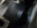 Lavaggio a vapore di un tappeto auto