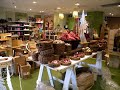 Green Christmas elves prepare eco store...