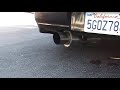 me taping the exhaust of the subaru
